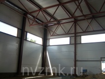 Новинский завод металлоконструкций выполнил заказ на изготовление и постройку гаража из основных стальных строительных конструкций г. Сургут.